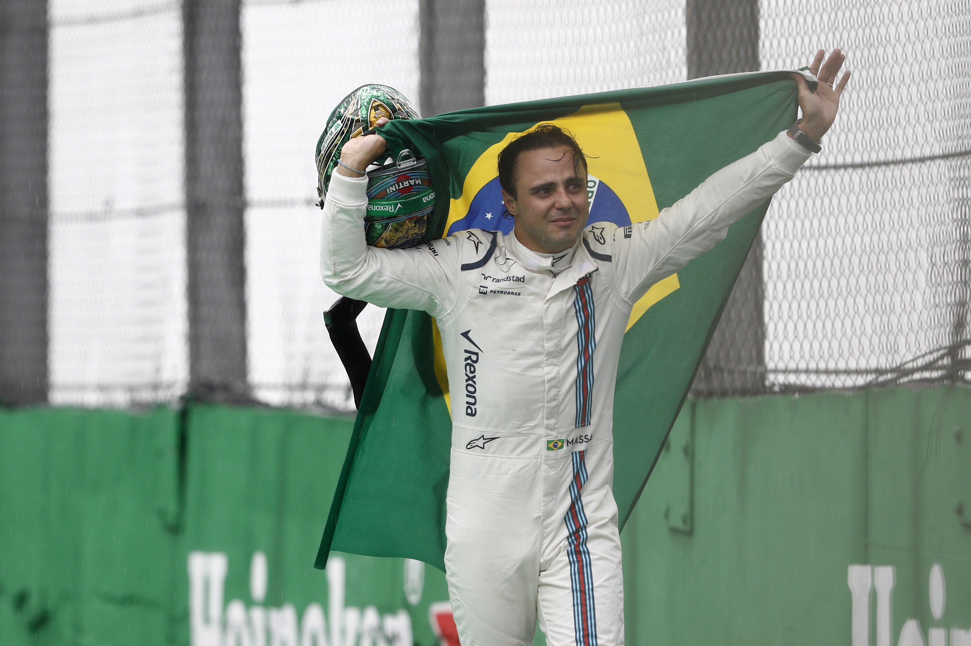 Interlagos, Sao Paulo, Brazil. Sunday 13 November 2016. An emotional Felipe Massa, Williams Martini Racing, makes his way back to the garage after retiring from the race. Photo: Glenn Dunbar/Williams ref: Digital Image _X4I8028