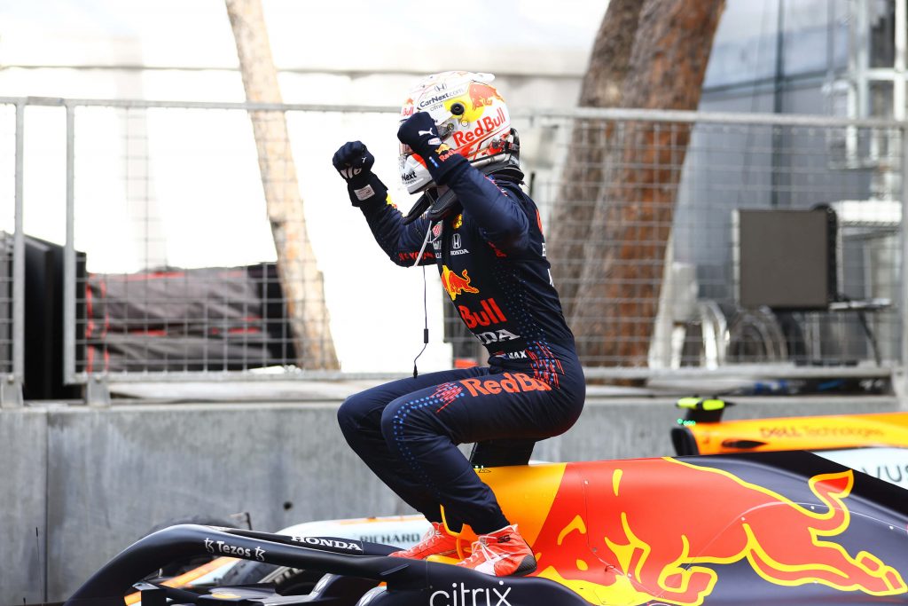 max-verstappen-monaco-grand-prix-2021 celebrating with red bull team celebrating the win